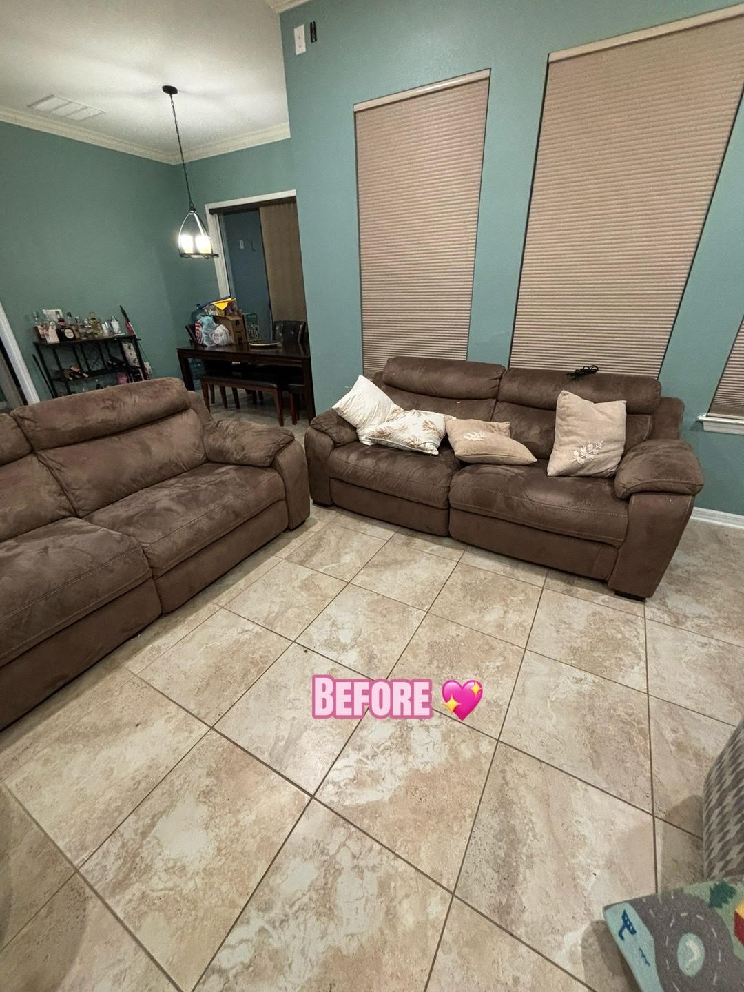 living room with sofas before cleaning