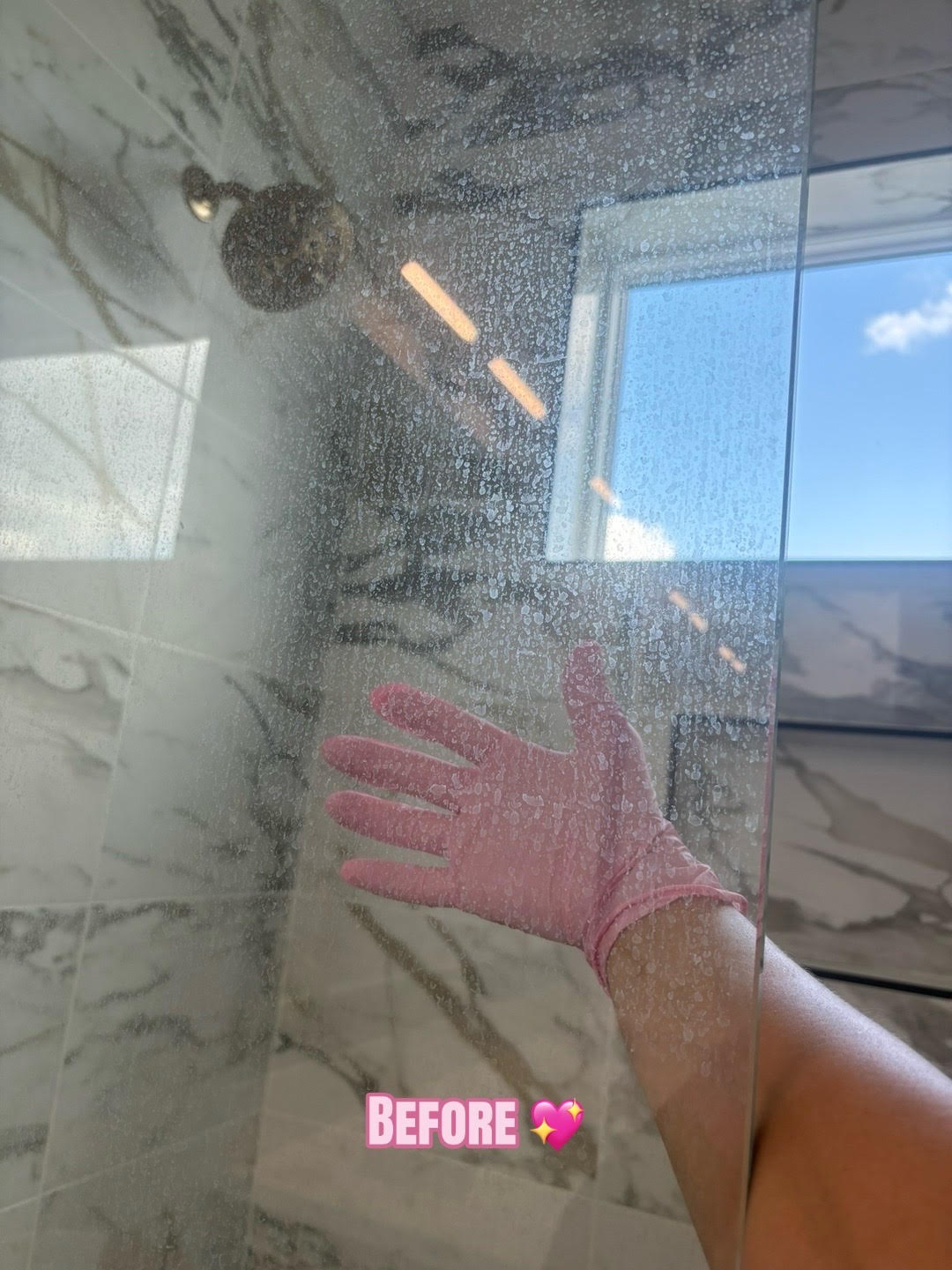 glass shower door before cleaning